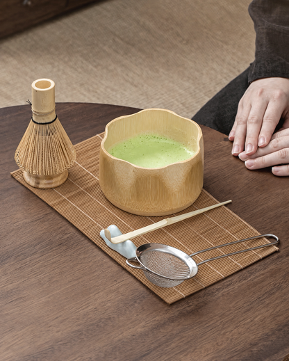 Bamboo matcha bowl set on a bamboo placemat